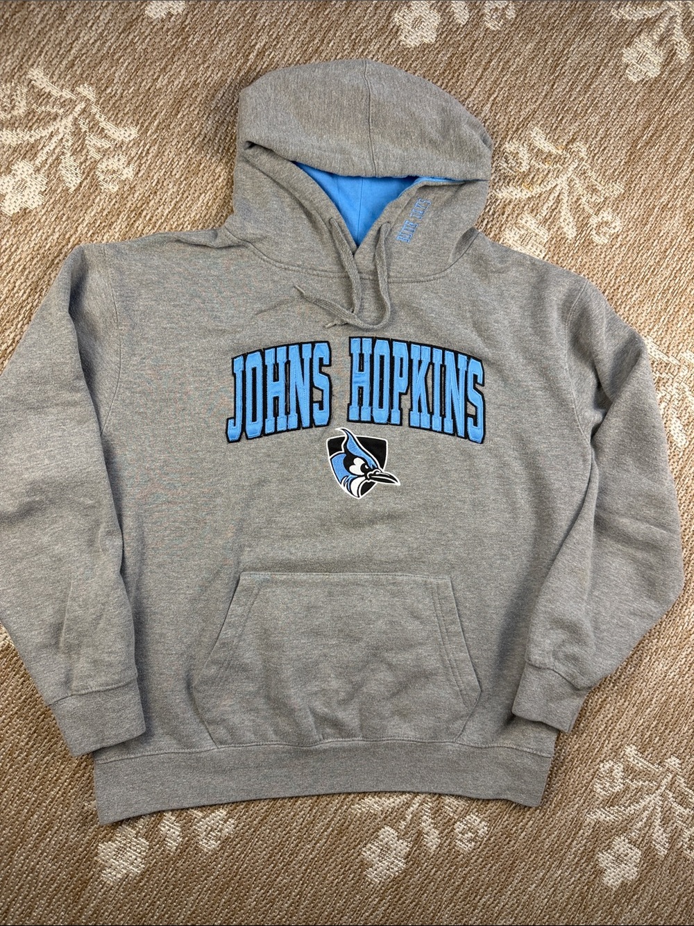 Stadium Athletics Gray Crewneck Hoodie with Light Blue Johns Hopkins Logo